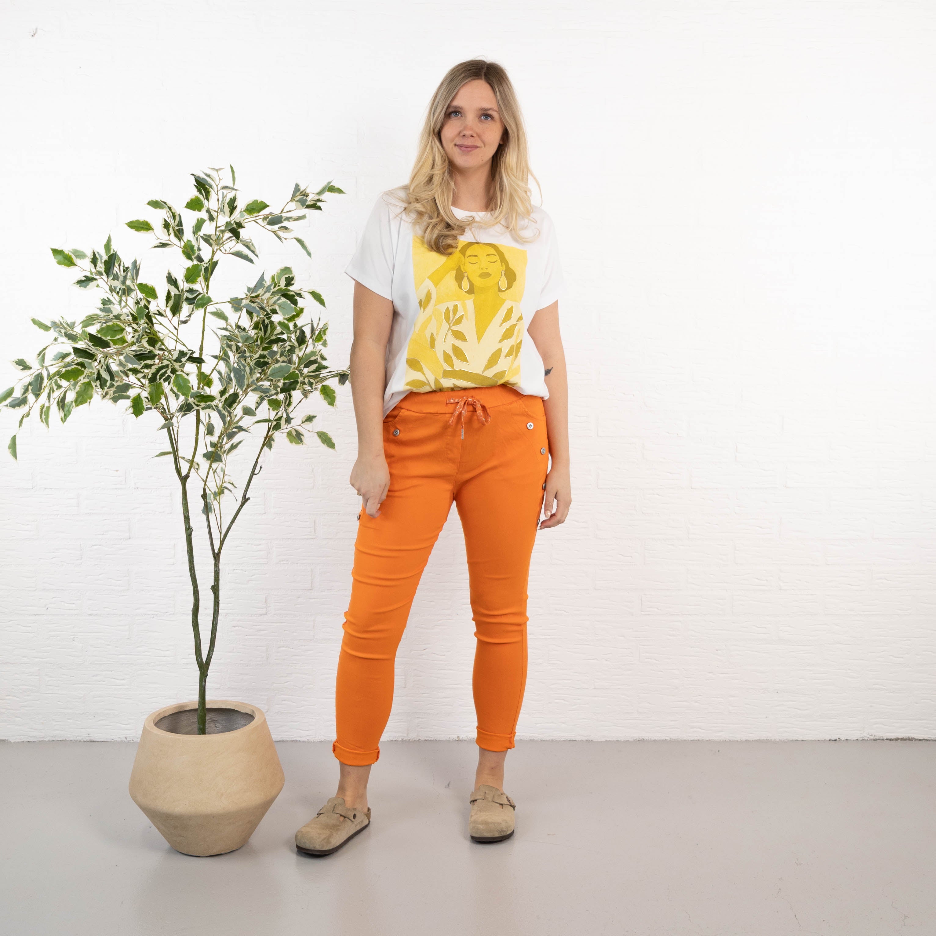 Kela bukser, Orange
