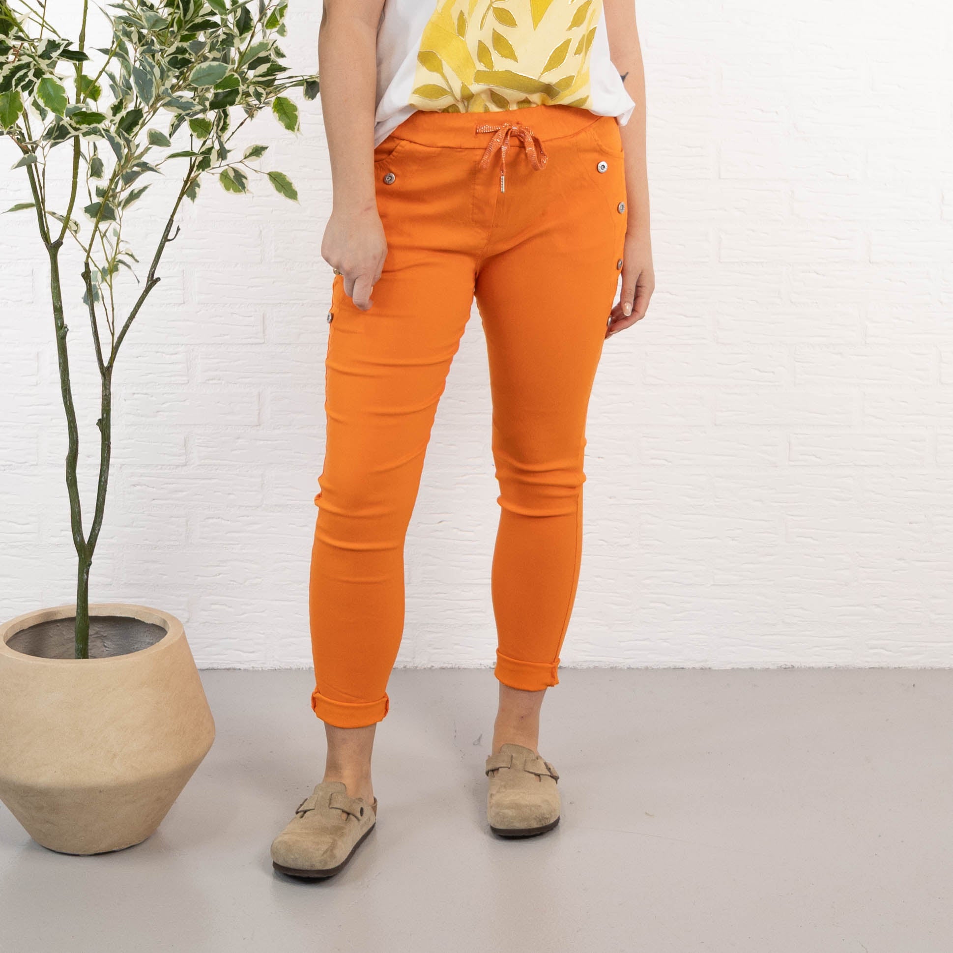 Kela bukser, Orange
