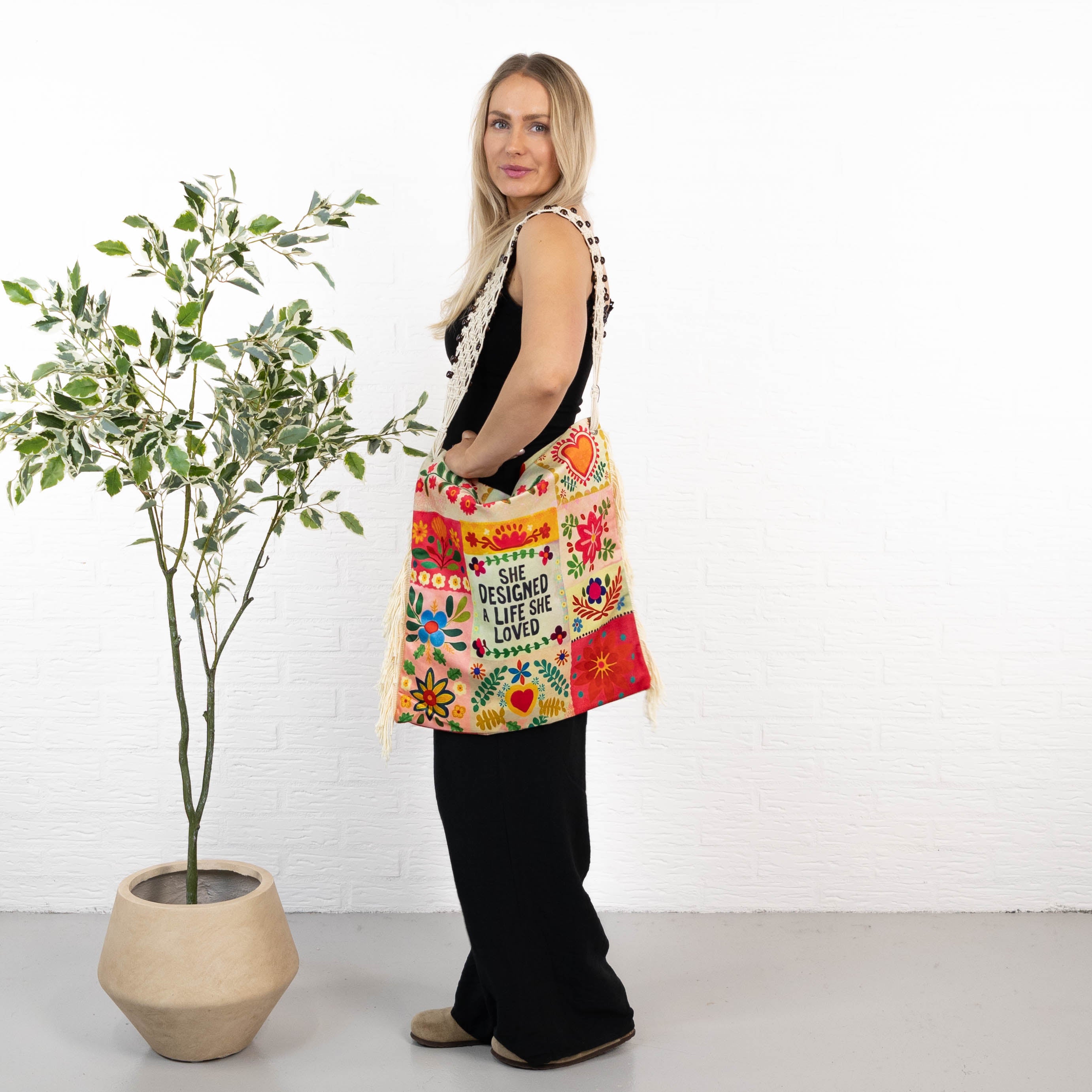 Love is alive taske, She designed