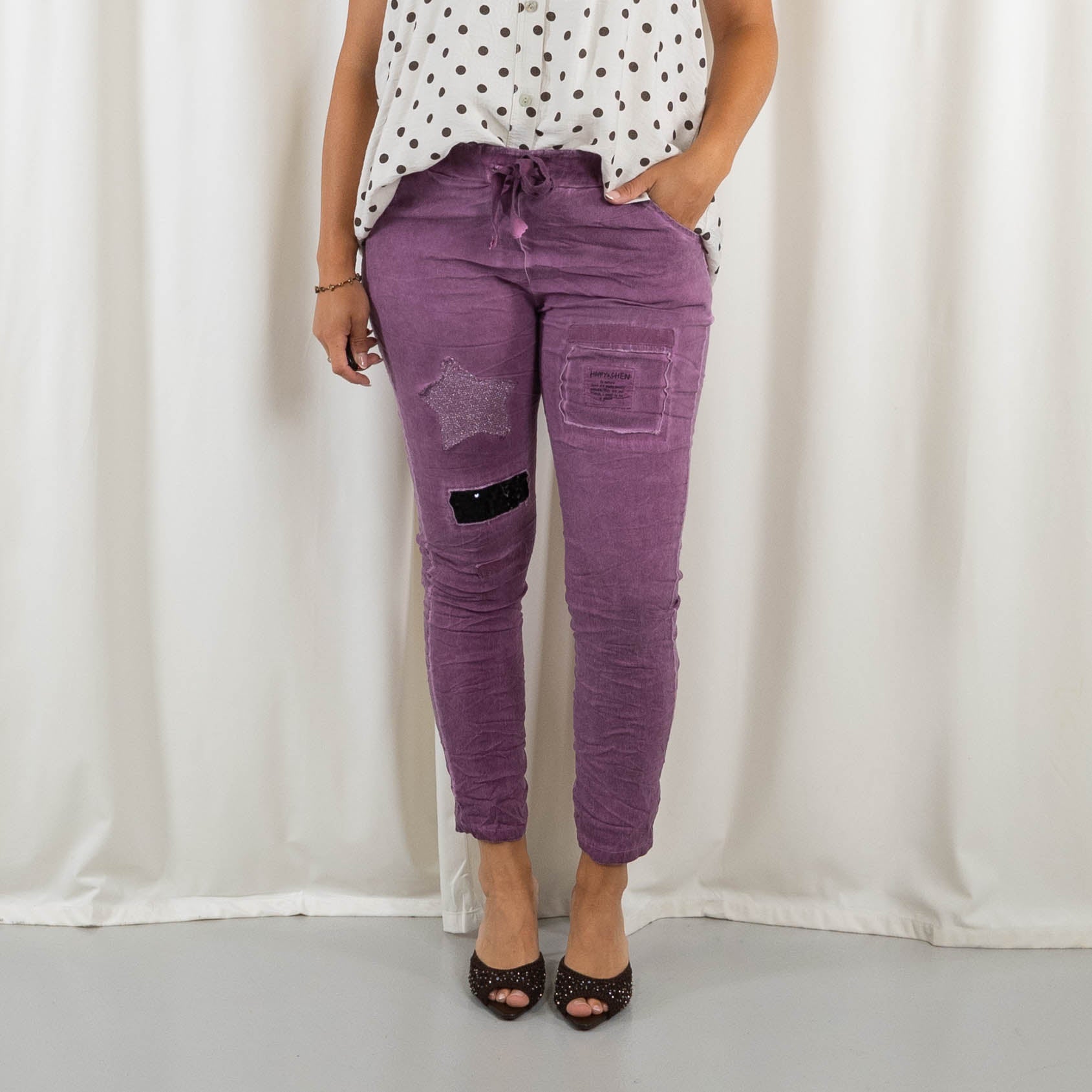 Saturn bukser, Purple