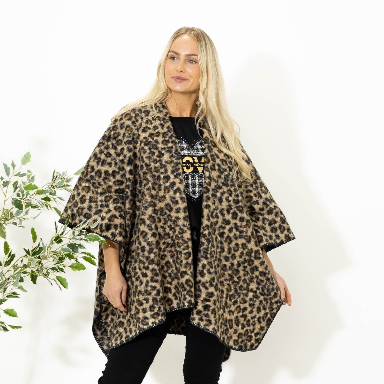 Dallas leopard poncho. Leopard