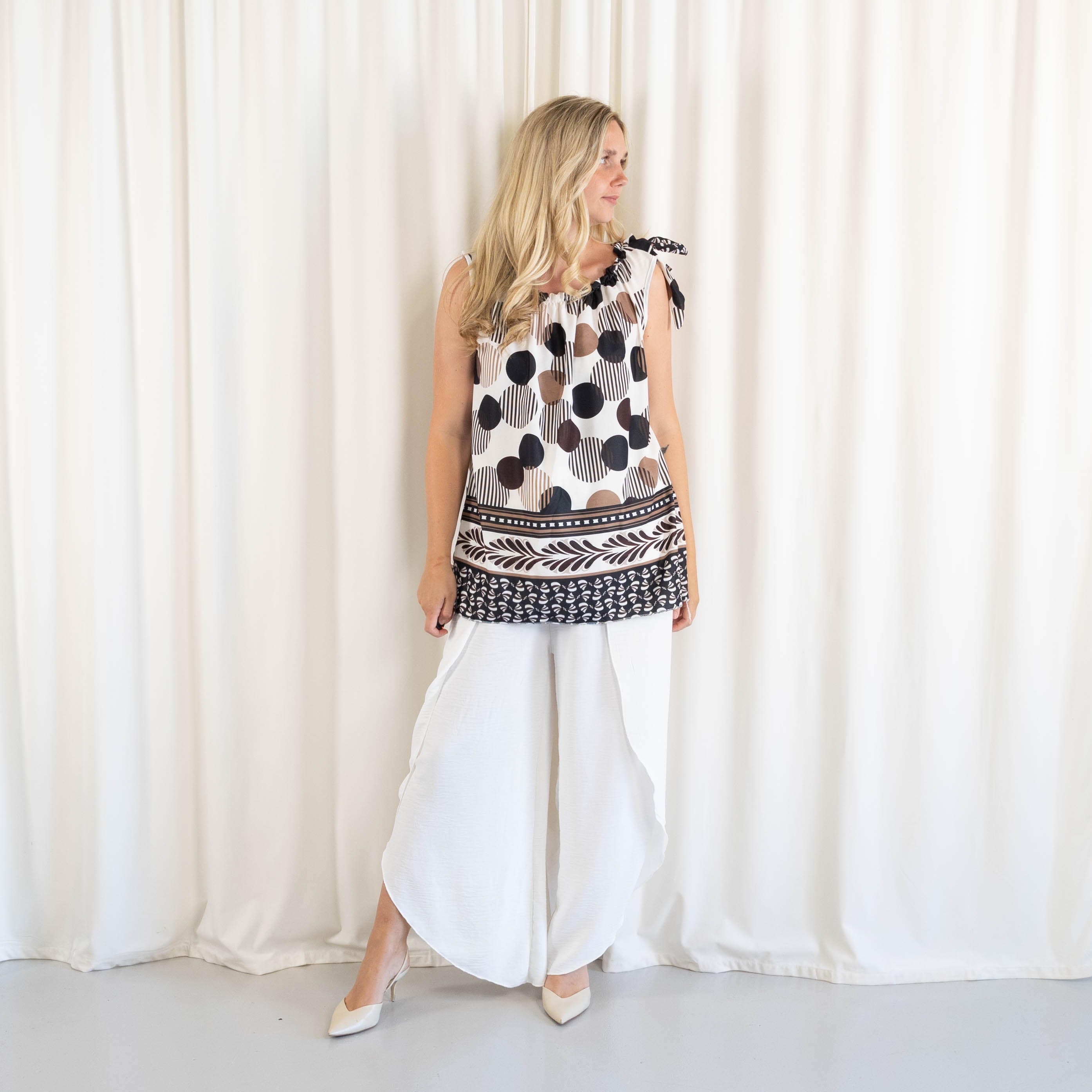 Mirage top, Sort