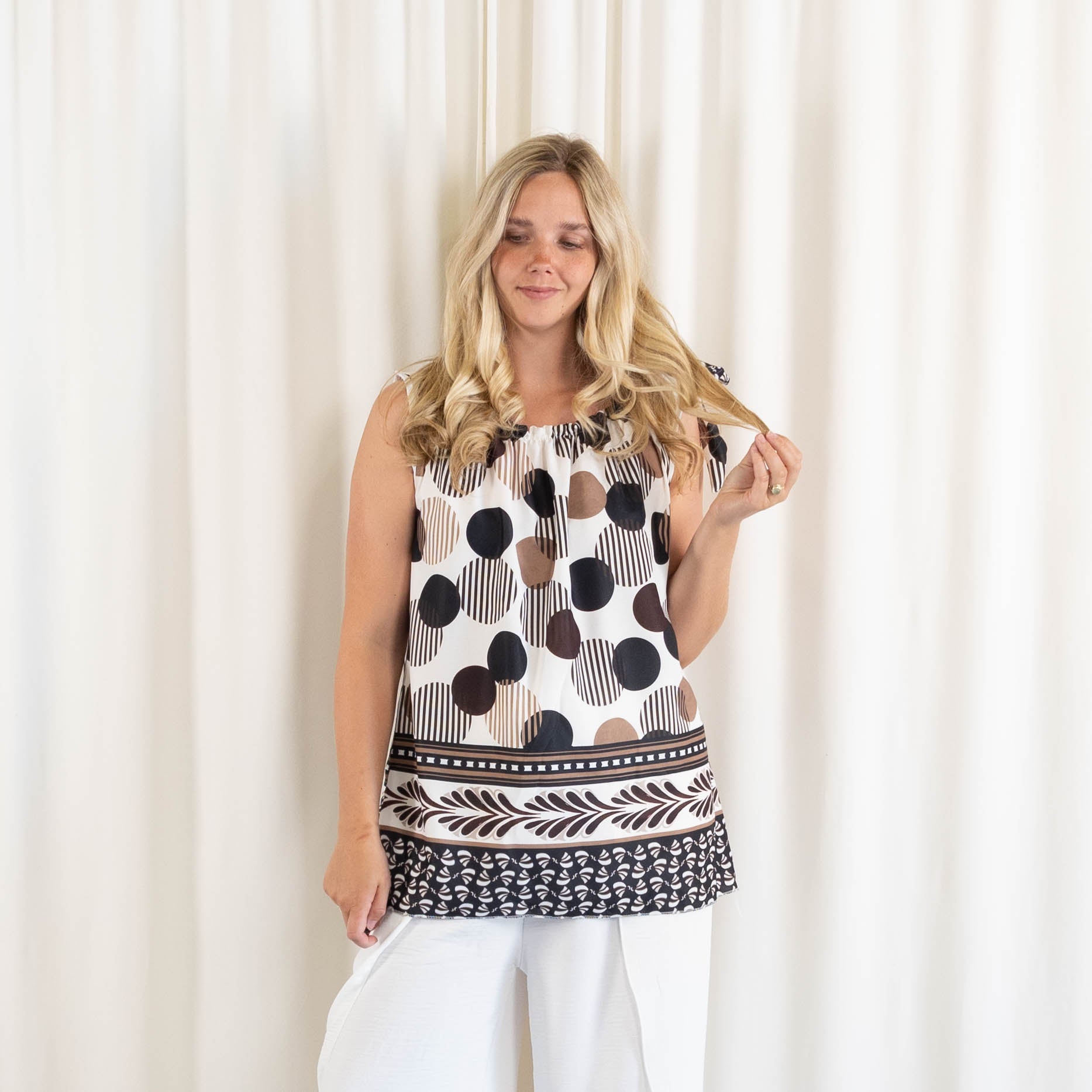 Mirage top, Sort