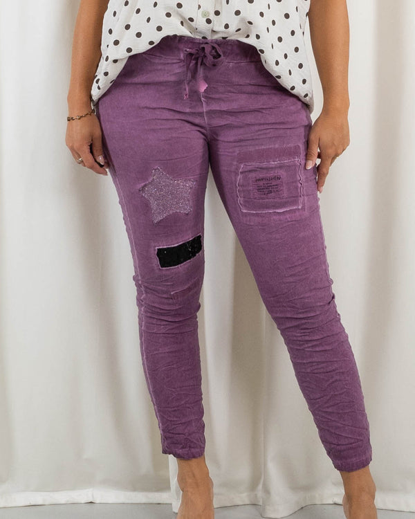 Saturn bukser, Purple