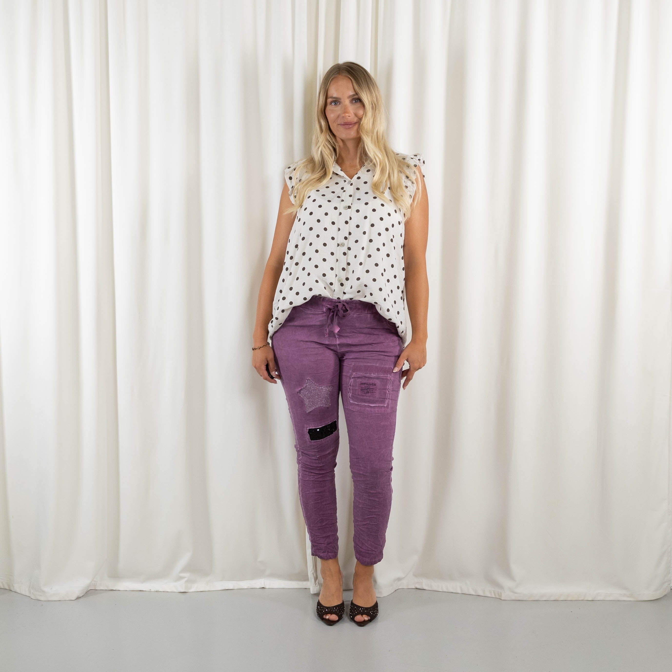 Saturn bukser, Purple
