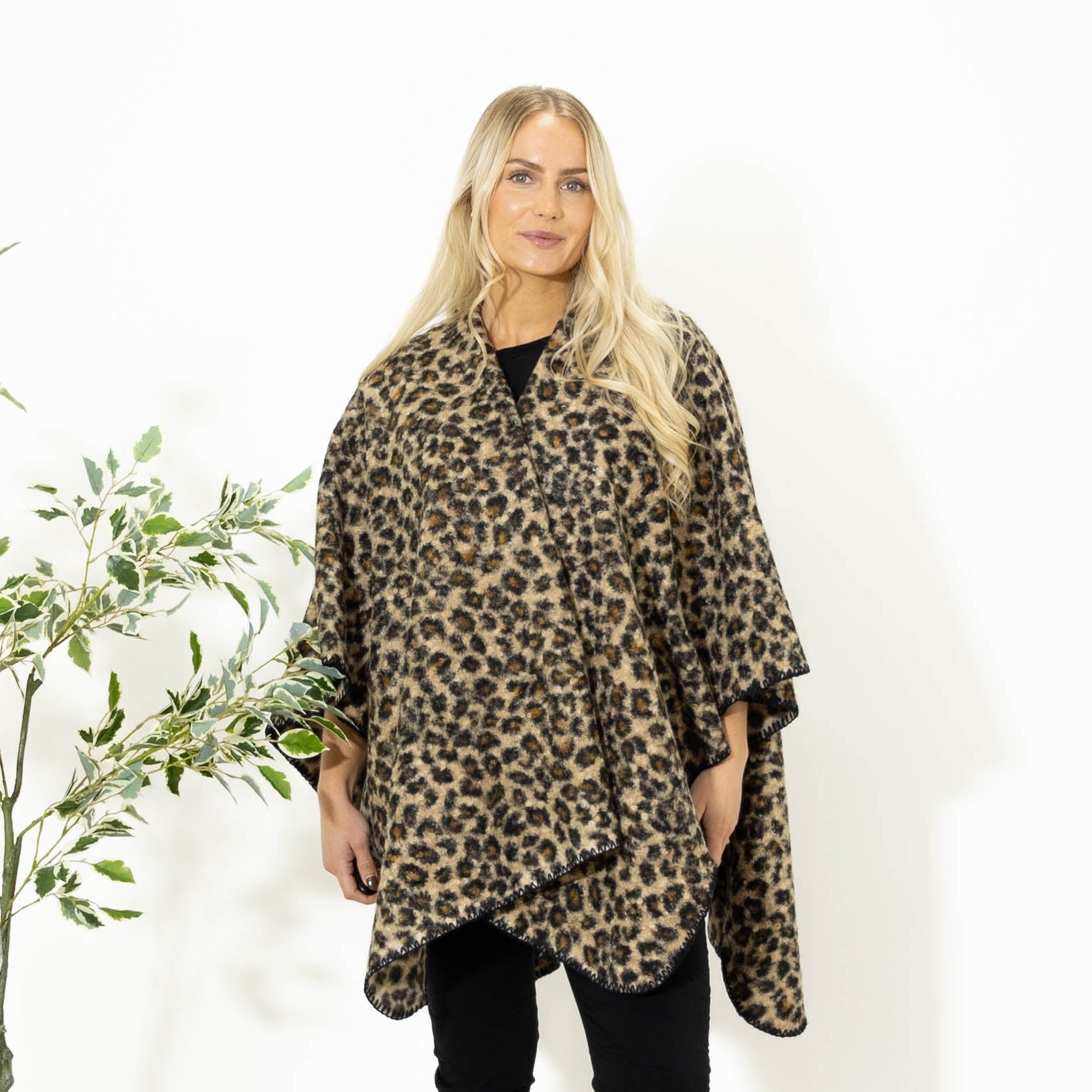 Dallas leopard poncho. Leopard